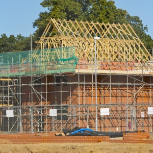 A new development of affordable homes, with new foundations in the foreground