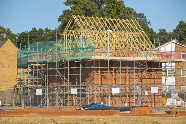 A new development of affordable homes, with new foundations in the foreground