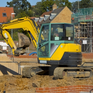 A digger or backhoe working on a construction site