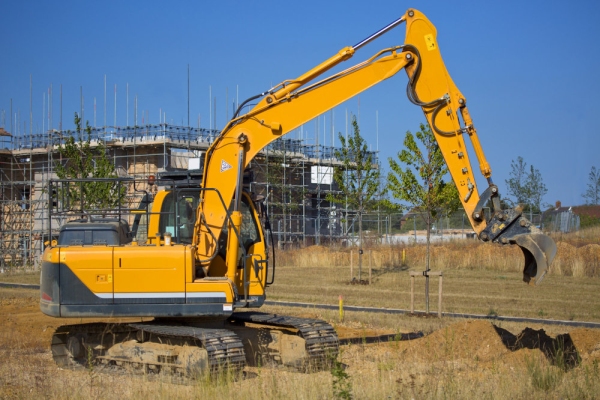 A caterpillar earth mover working on a building site