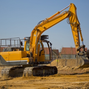 A digger or earth mover on a building or construction site