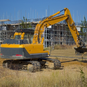 A digger or earth mover or backhoe on a construction site or building site