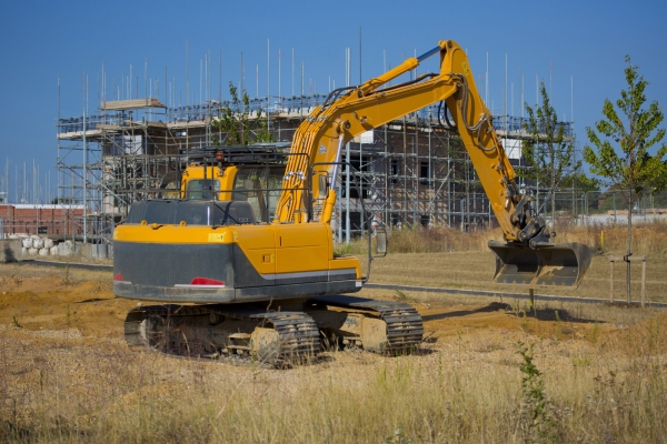 A digger or earth mover or backhoe on a construction site or building site