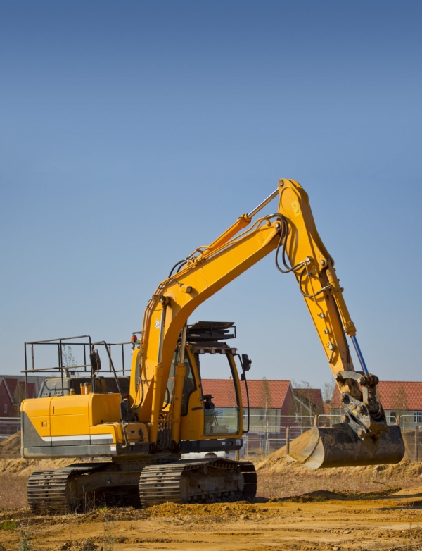 A digger or earth mover or backhoe on a construction site or building site