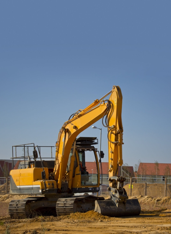 A digger or earth mover or backhoe on a construction site or building site