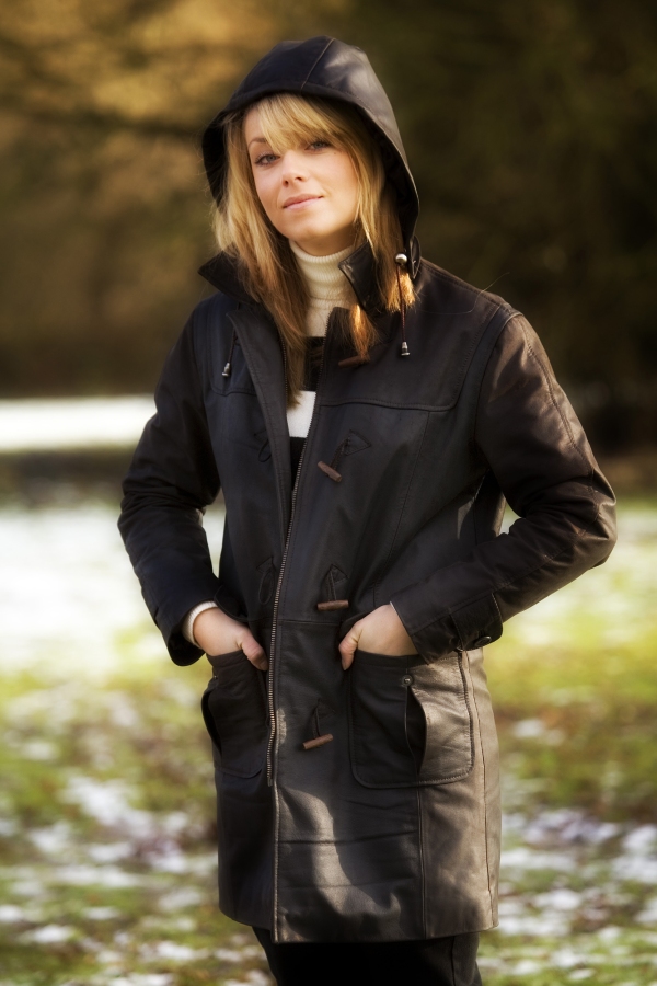 Pretty girl wearing a leather coat on a winter's day