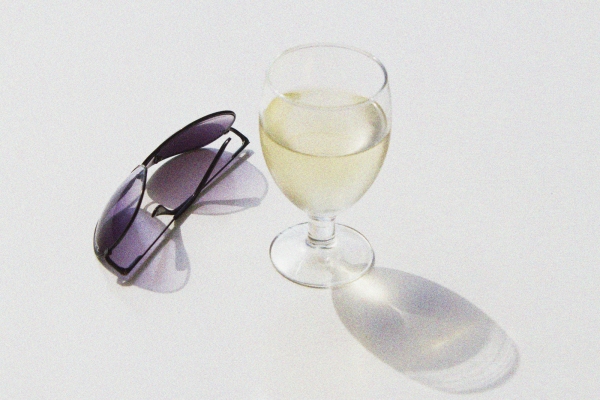 sunglasses and a glass of wine, manipulated image