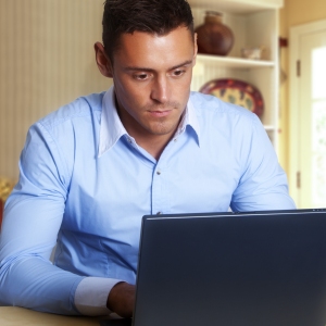 Man working at laptop computer