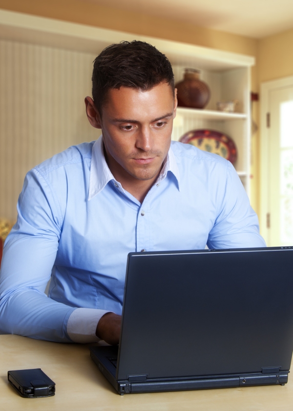 Man working at laptop computer