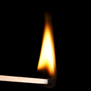 Lighted match with tall flame