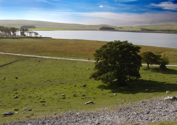 A view of the Yorkshire Dales with Balham Tarn in the distance