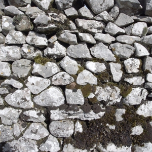 A close up of a dry stone wall