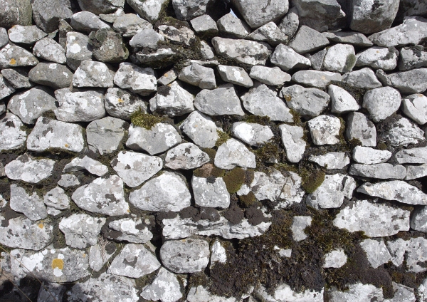 A close up of a dry stone wall