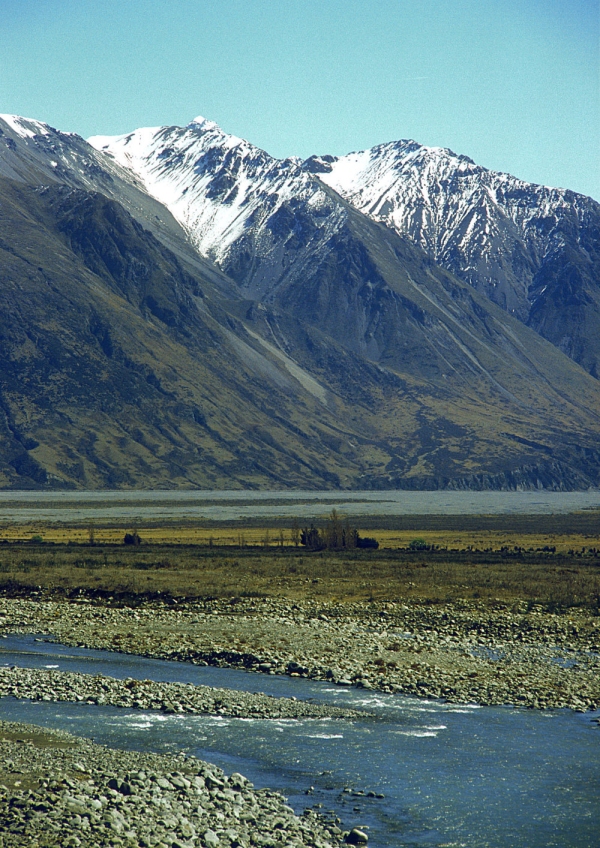 A rocky river in a mountainous New Zealand landscape