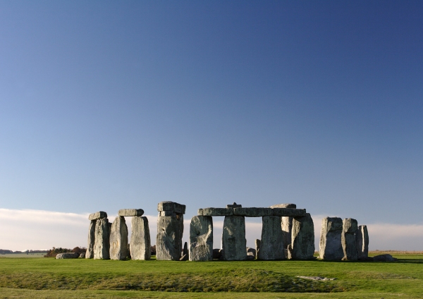 The Stonehenge monument against a clear blue sky