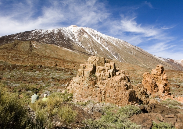 El Teide, Tenerife's extinct volcano with jagged rocks in the foreground