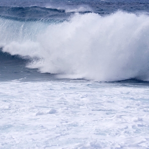 Surf and spray on a mediterranean beach