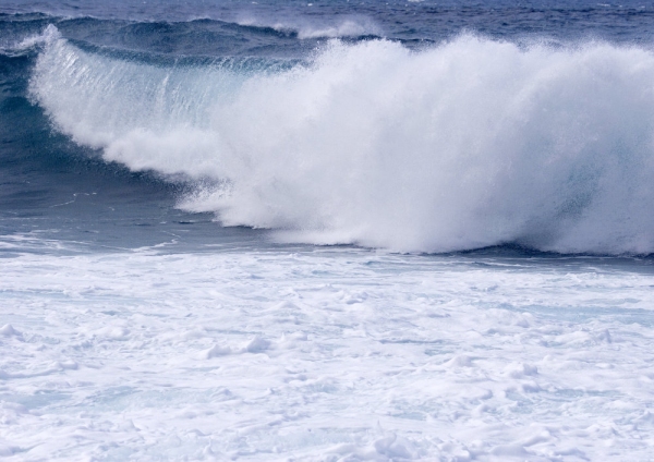 Surf and spray on a mediterranean beach