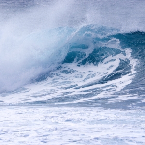 A classic surfer wave in a high sea