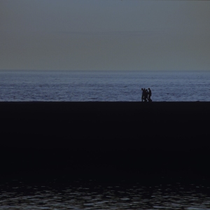 Walkers on the beach