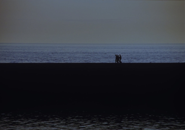 Walkers on the beach