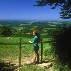 A young boy admiring the view in the Auvergne in Southern France