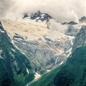 Clouds and glaciers in the high Alps