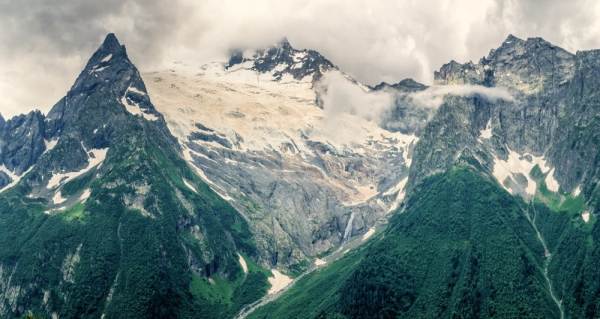 Clouds and glaciers in the high Alps