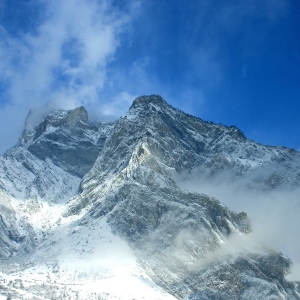 The French Alps covered in snow on a sunny day