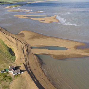 Aerial view of the mouth of the river alde at shingle street, looking towards orford ness