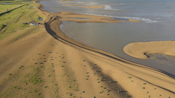 aerial view of the the shingle banks at the mouth of the river alde on the suffolk coast