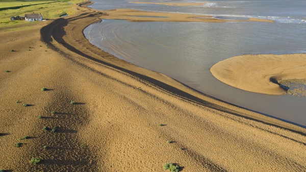 An aerial photo of shingle banks on the suffolk heritage coast on the Alde estuary