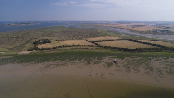 An aerial photograph of the Essex coast and Blackwater estuary at Heybridge Basin, near Maldon in Essex