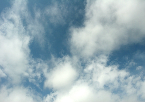 White clouds in a blue sky