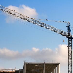 A large building site crane on a large construction site