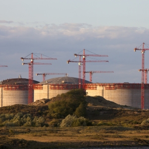 Industrial oil or chemical storage tanks on the coast