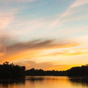 A sunset over the Taiga river in the far East of Russia.