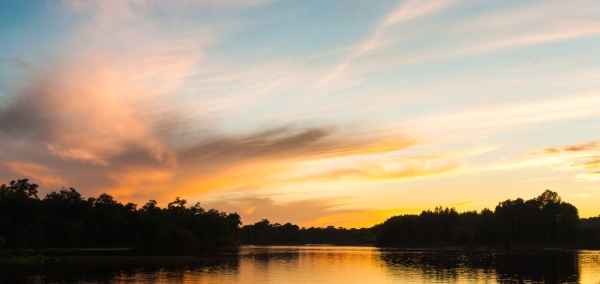 A sunset over the Taiga river in the far East of Russia.