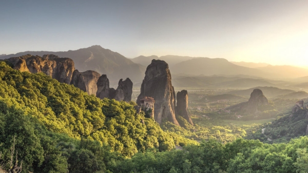 Panoramic view of the Rousanou Monastery in Meteora, Kalambaka town in Greece, on a sunny summer evening