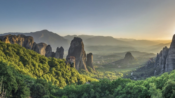 Panoramic view of the Rousanou Monastery in Meteora, Kalambaka town in Greece, on a sunny summer evening