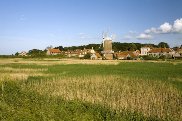 Cley next the sea from across the marshes in North Norfolk