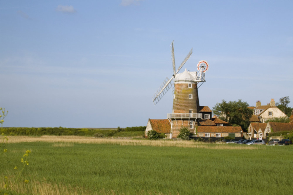 Cley next the sea in North Norfolk seen from across the marshes