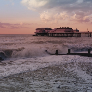 Cromer pier in a storm, from the west