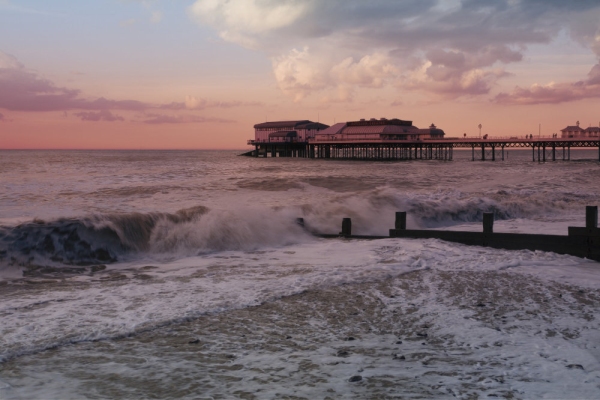 Cromer pier in a storm, from the west