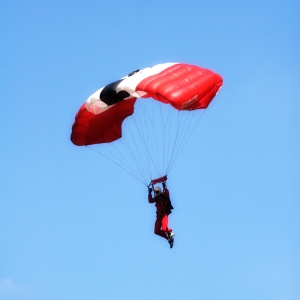 A member of the Parachute Regiment display team about to land