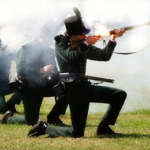 Firing muskets in a period military re=enactment