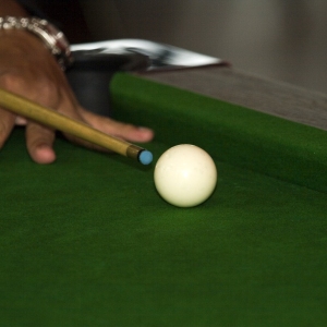 A close up of a snooker cue or pool table