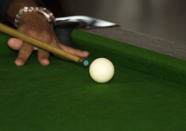 A close up of a snooker cue or pool table