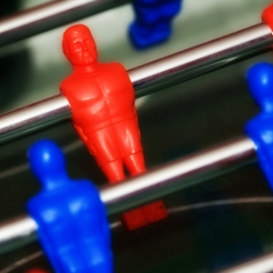 A close up of a table football machine