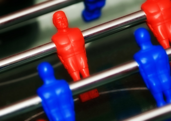 A close up of a table football machine